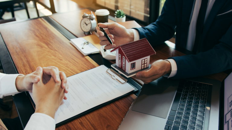Two people negotiating house sale